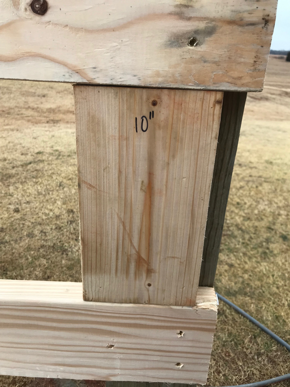 Easily place a gap between boards when building a split rail fence.